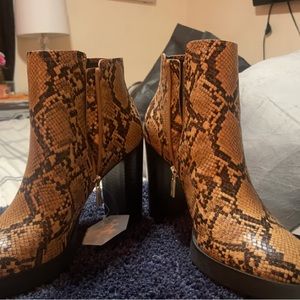 Snakeskin bootie brand new never worn